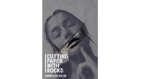 Cutting Paper With Rocks by Andrea Rizzolini