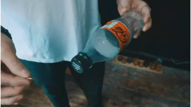 Slo Mo Coin in Bottle by Lloyd Barnes - Money & Coin Tricks